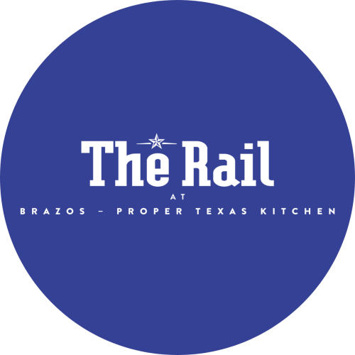 The image is a blue circular logo for &ldquo;The Rail,&rdquo; with white text that reads The Rail at Brazos &bull; Proper Texas Kitchen, centered in the circle.