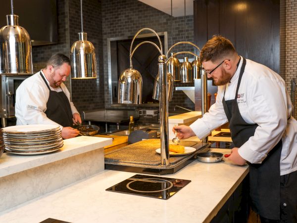 Chef Shane and Chef Kevin in exhibition kitchen